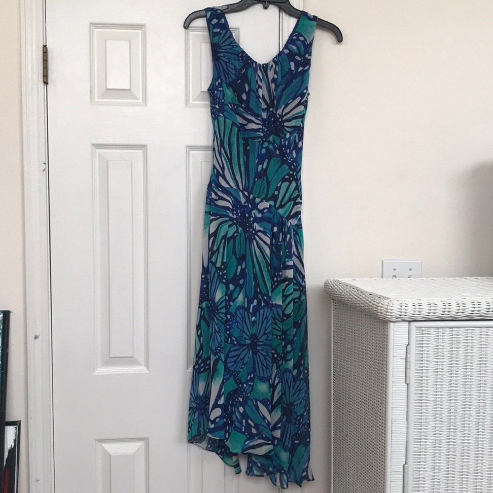 Beautiful dress of blue, green and white.